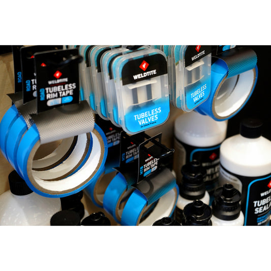 Complete Weldtite wood tubeless POS display (4x 1l tubeless sealant / 8x 240ml tubeless sealant / 12x 2 tubeless valve kits / 7x MTB tubeless rim tape / 4x road tubeless rim tape)