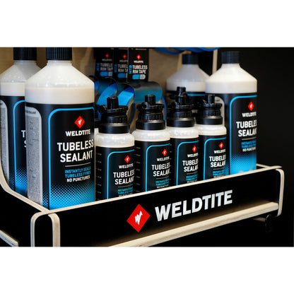 Complete Weldtite wood tubeless POS display (4x 1l tubeless sealant / 8x 240ml tubeless sealant / 12x 2 tubeless valve kits / 7x MTB tubeless rim tape / 4x road tubeless rim tape)