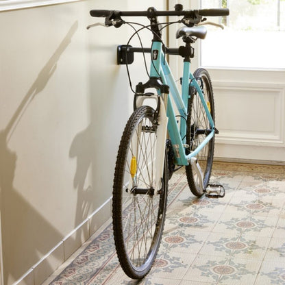 Support mural pliable vélo / trottinette noir avec mousse pride par tige de selle vélo ou axe direction pour trottinette